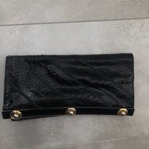 Real snakeskin clutch